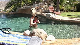 Naughty Cindy bares her juicy melons by the glistening pool