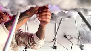 Pierced and tattooed boy sucking black cock from glory hole