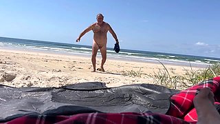Fat wife blows on the beach