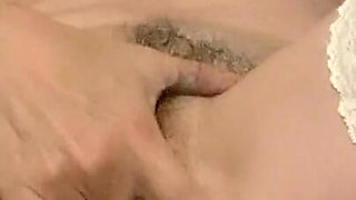 Hot milf with perfect hairy pussy masturbates to squirt orgasm