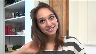 Petite young Sara Luv fucks her pussy in the kitchen