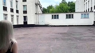 Hot Blonde in Red Skirt Sucks Cock on Balcony