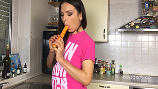Playful Young Burnette Nataly Gold Prepares Carrot in Proper Way