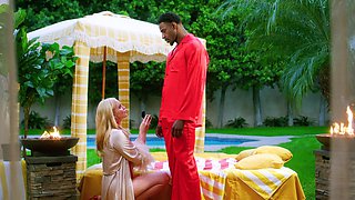 Two blondes are having a threesome with Jax Slayher and Charlie Forde by the pool.