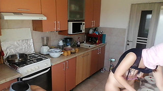 Amateur couple cooks naked in the kitchen