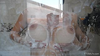 Soapy solo masturbation makes premium brunette MILF come like never before