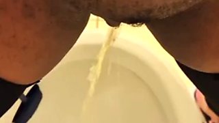 Ebony pees standing up