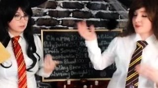 In a kitchen a sexy brunette playing with her big boobs