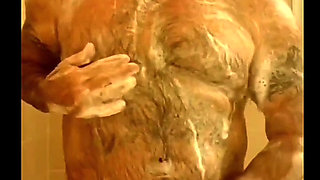 Tank4154 jerks off his good cock in the shower and on the couch.