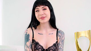 Brunette Charlotte Sartre in sexy stockings and o-ring underwear