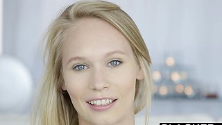 Two cute girls with long blond hair are having fun with guys in a sensual scene.