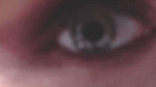 A Girl Is Messing with a Macro Camera