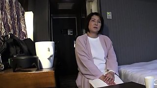 Japanese MILF sucks dick in bus orgy