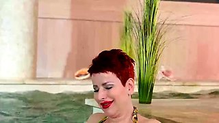 Busty MILF Lisa Pinelli in an Intimate Solo Scene