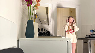 Amazingly beautiful petite blonde hot college girl in her dormitory kitchen getting ready for Christmas Party