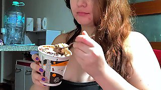 Hot Chubby Woman Filling Her Round Belly with Some Sweets