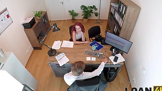 Redhead hottie Sirena Milano rides cock on the table.