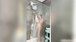 Showering chick Lady Lyne is touching her pussy in the morning