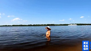 Blonde Solo Nudist Shows Off Tattoos by the River