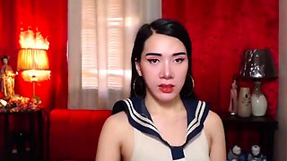 Asian shemale schoolgirl BitchSweetHeart jerks off on webcam