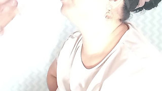 Mature woman sucking with eye mask