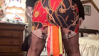 Dressed in a little patterned skirt for an evening out