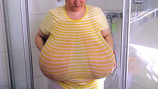 Busty curly brunette with big boobs fucks on couch