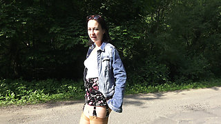 Golden shower and squirting on a road on saturday morning. Nylon stockings and garter belt as always, mandatory.