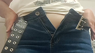 MILF taking off her clothes, urinating, leaving her vagina wet and hot.