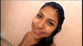 Exotic beauty washing her hairy pussy in the bathroom while her man wants to fuck her