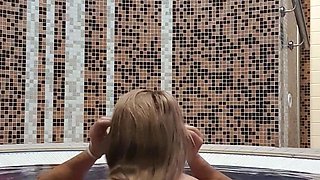 Busty amateur milf masturbates in the shower