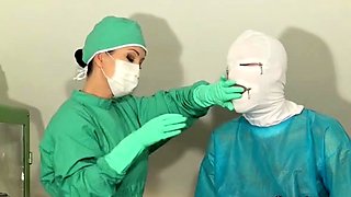 Dominant milf doctor brings masked slave's cock to orgasm