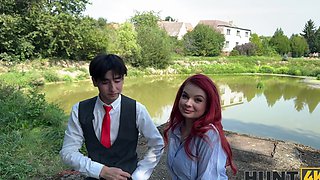 A pale girl with red hair is fucking with her instructor outdoors