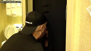 Gloryhole BJ DILF sucks besides open door of toilet