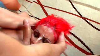 Inked slut with colored hair deep throating hard cock