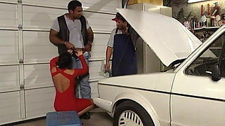 Threesome in the Car Garage with a Black Stud and Double Penetration