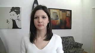 Sweet brunette teen is toying and fingering her shaved pussy