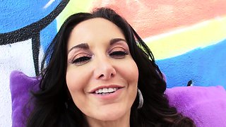 Attractive brunette teenager with big boobs fingering pussy