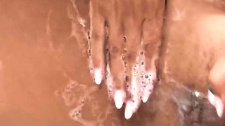 A MILF Wife Shaves Her Pussy in the Shower and Masturbates with Orgasm and Squirt. 31931