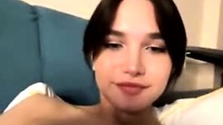 Amateur young brunette enjoys dildo on solo masturbation