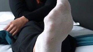 Busty brunette foot fetish and footjob in nylons