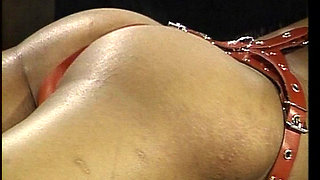German Black Slut Got Tied up and Whipped at Bondage Show