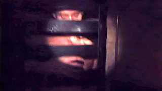 He Is in a Cage but Gets a Blowjob and Fucks Her Through the Bars