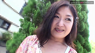 Horny MILF enjoys as clit gets rubbed by a huge vibrator