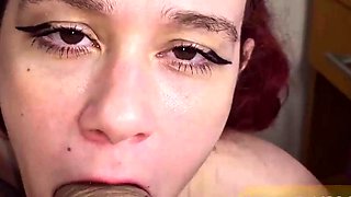 Redhead gives blowjob until she gulps cum