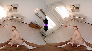 Redheaded cutie Nicole in VR bliss
