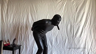 Dominatrix mistress April rubber slave punishment