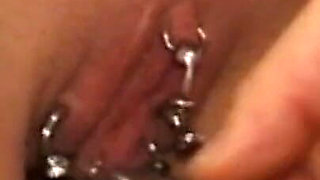 Tattooed girl humiliating pussy tightening