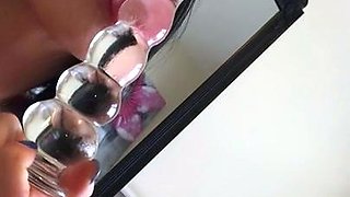 Brunette with big boobs and ass toys her wet cunt