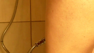 Blonde Pregnant Stepsister I Sit Naked in the Corner of the Shower, Legs Spread, My Belly Visible.